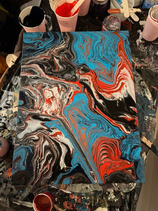 Acrylic pour painting in blue and red made by Tracey, a Handy Mandy customer